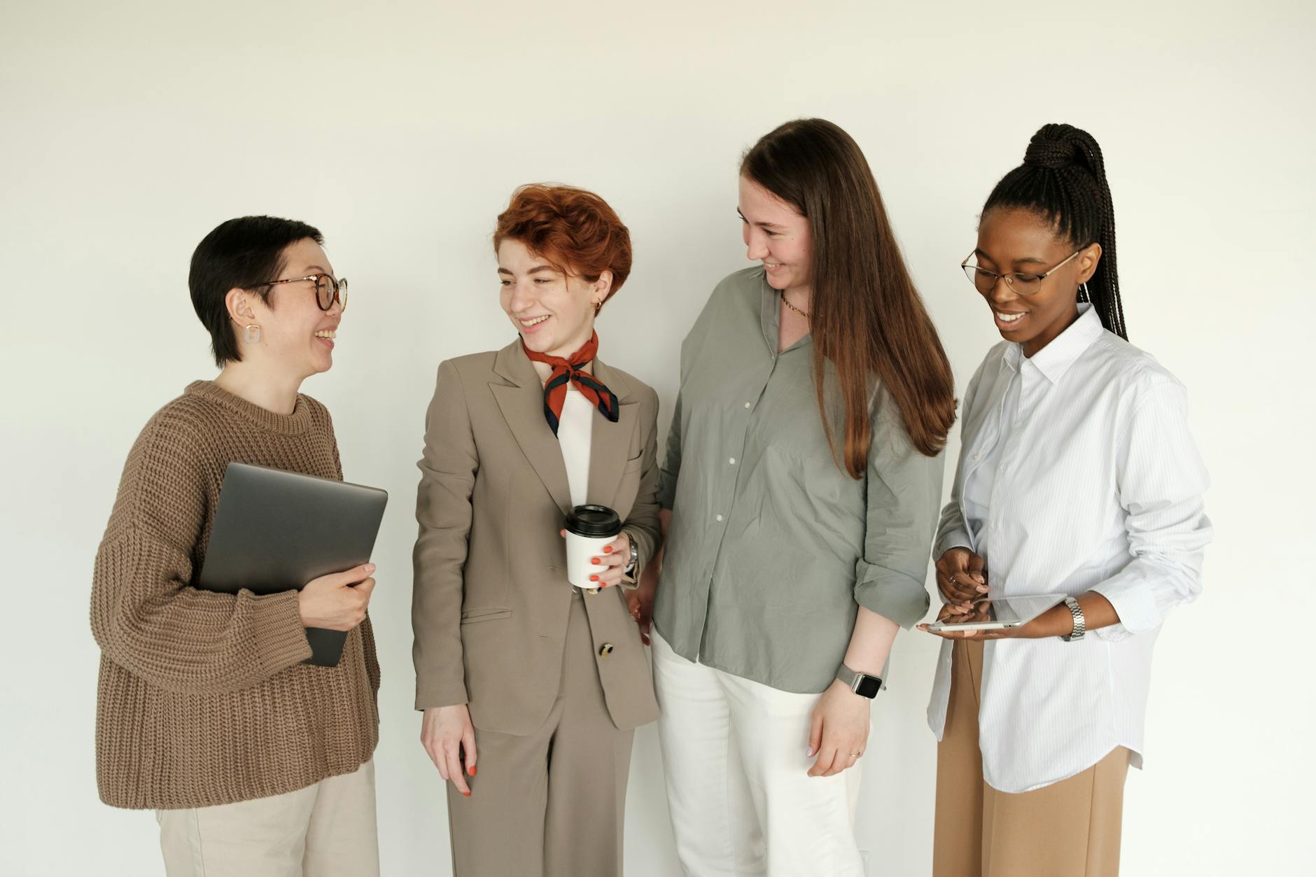 group of women office workers smiling